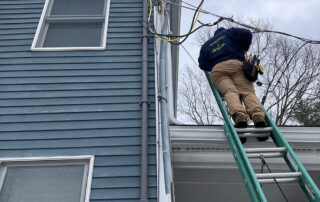 man on ladder doing electrical work is part of d'ambrosio electric services image gallery
